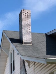 white chimney with blue sky