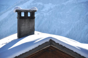 snowy roof and chimney